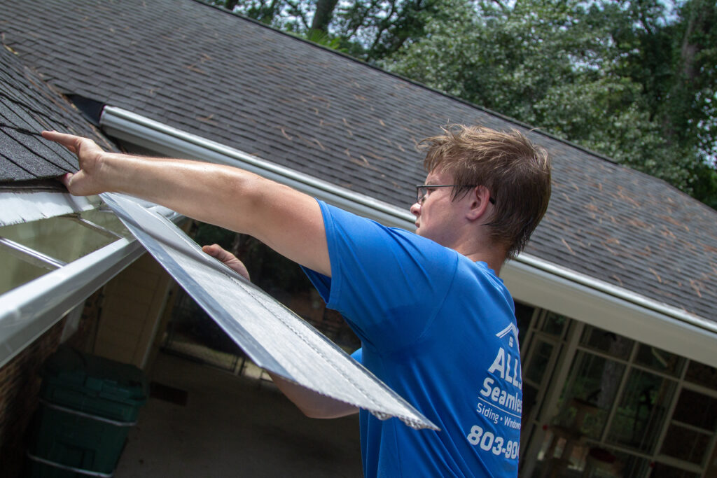 Gutter pro installs our lifetime gutter protection on a seamless gutter install by Columbia Gutter Pros